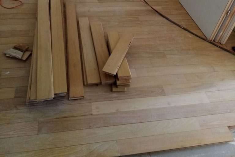 Reprise de parquet massif après sinistre
