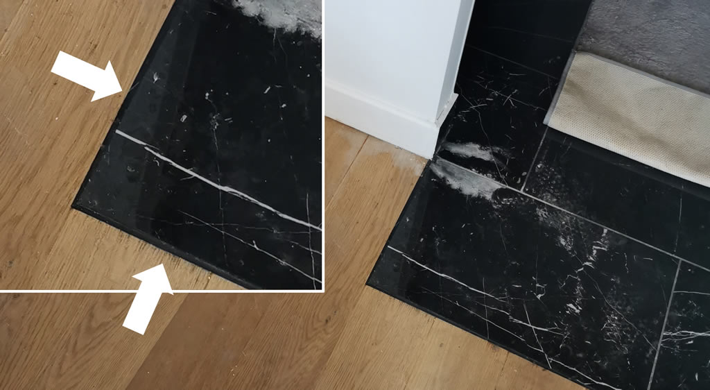 Jonction entre parquet et carrelage aspect marbre / Salle de bain